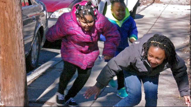 Three girls continue to dodge sun